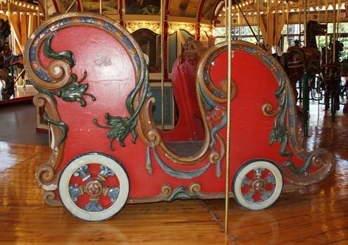 A close up of a carousel

Description generated with high confidence