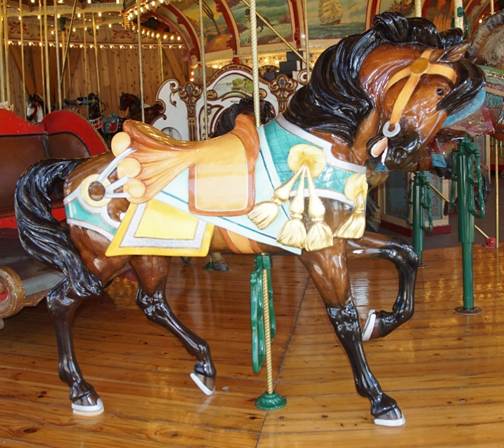 A close up of a carousel

Description generated with high confidence