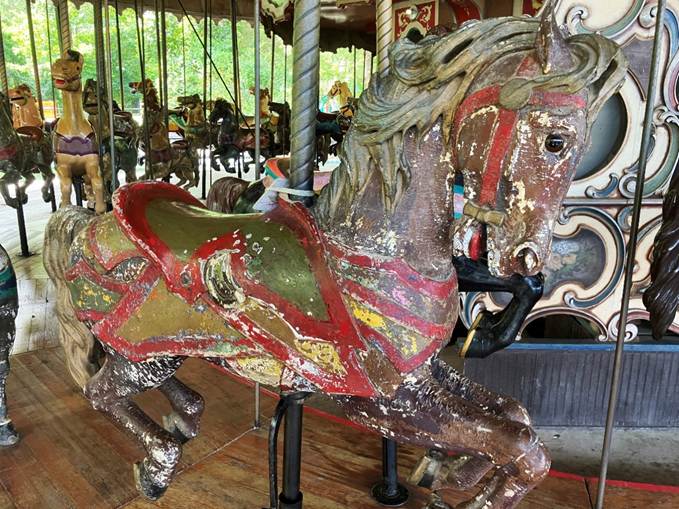 A merry go round with a horse

AI-generated content may be incorrect.