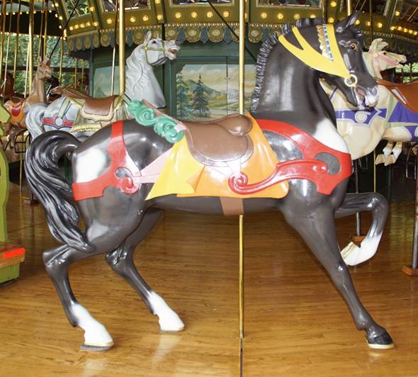 A statue of a carousel

Description automatically generated