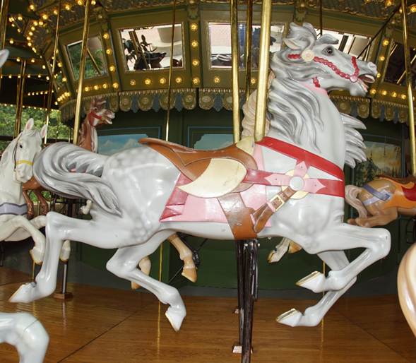 A close up of a carousel

Description automatically generated