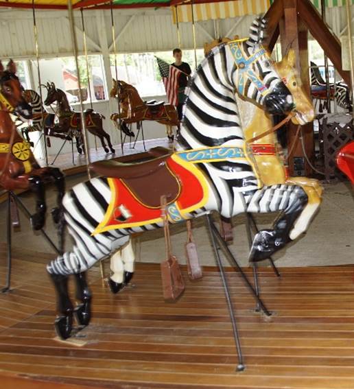 A close-up of a carousel

Description automatically generated