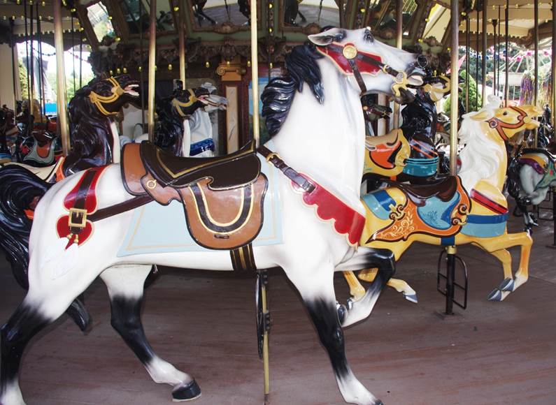 A close-up of a merry-go-round

Description automatically generated
