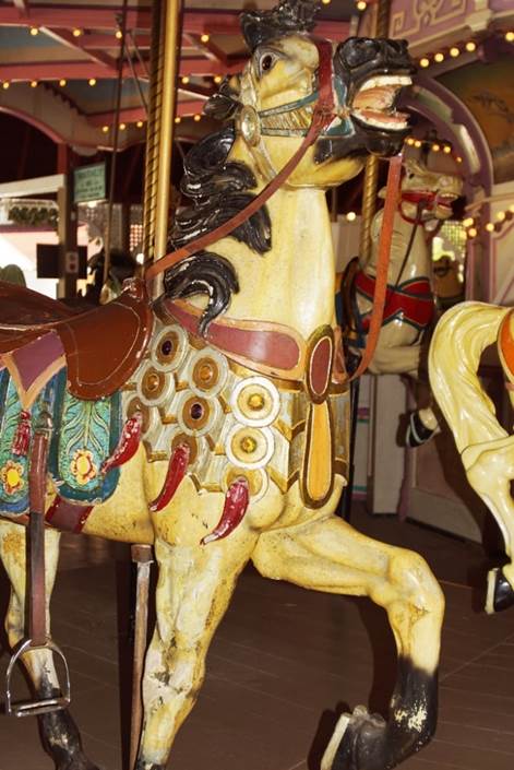 A picture containing indoor, table, carousel, sitting

Description automatically generated