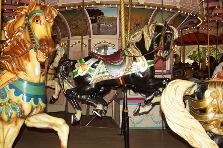 A close up of a carousel

Description automatically generated