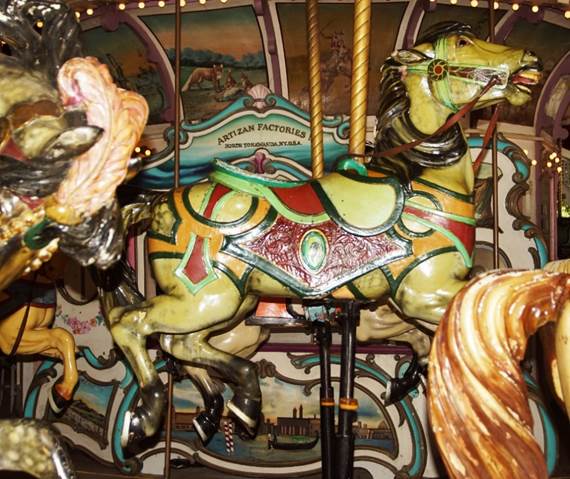 A close up of a carousel

Description automatically generated