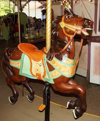 A close up of a carousel

Description automatically generated