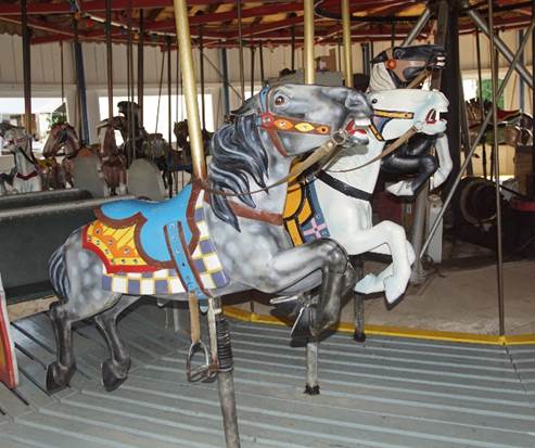 A close-up of a merry-go-round

Description automatically generated