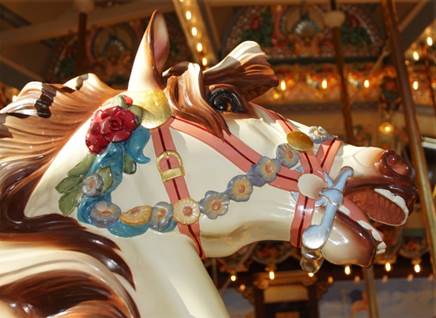 A close up of a carousel

Description automatically generated