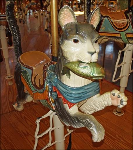 A picture containing indoor, floor, table, sitting

Description automatically generated