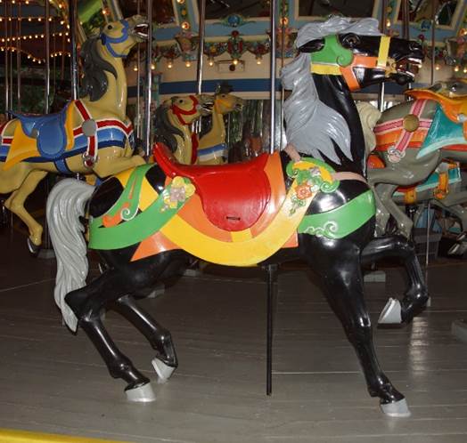 A colorful horse on a merry go round

Description automatically generated