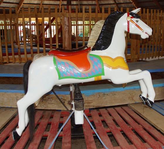 A statue of a carousel

Description automatically generated