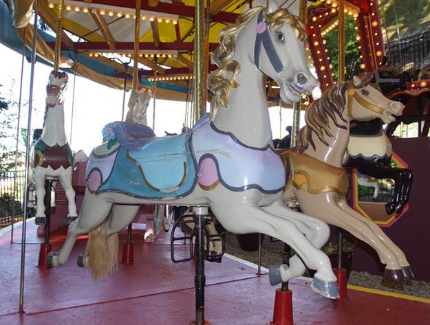 A close up of a carousel

Description automatically generated