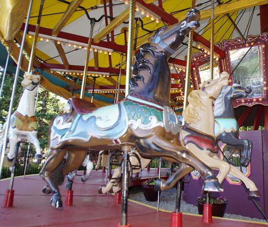 A close up of a carousel

Description automatically generated