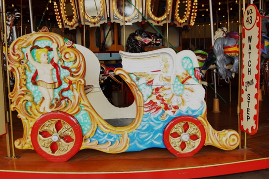 A close up of a carousel

Description automatically generated