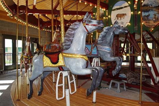 A statue of a carousel
Description automatically generated