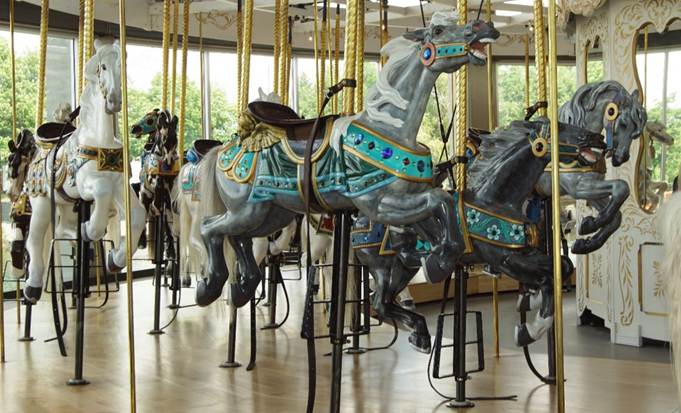 A close up of a carousel

Description automatically generated
